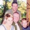 Andrei Krasko with his father, sister and niece (23 kB)